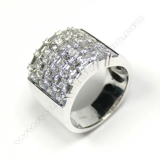 A large 18ct white gold 99 diamond ring