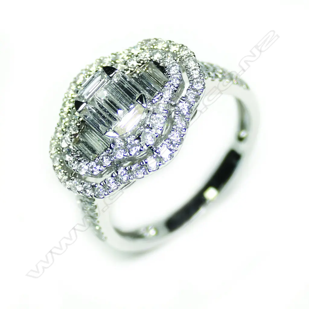 An 18ct white gold and multi diamond ring Image 1++