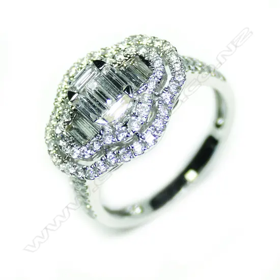 An 18ct white gold and multi diamond ring