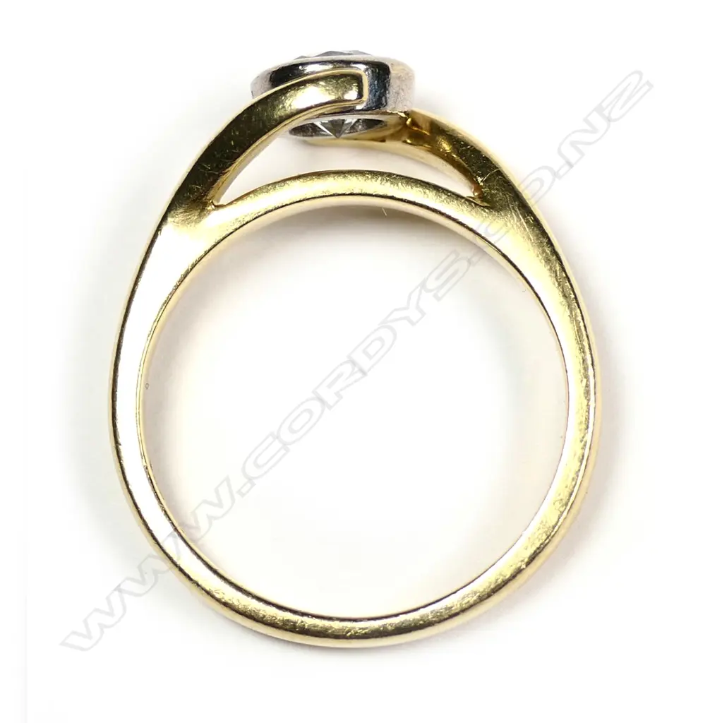 An 18ct solitaire diamond ring Image 1++