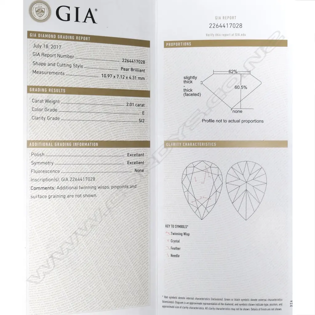 A platinum and diamond solitaire ring Image 1++