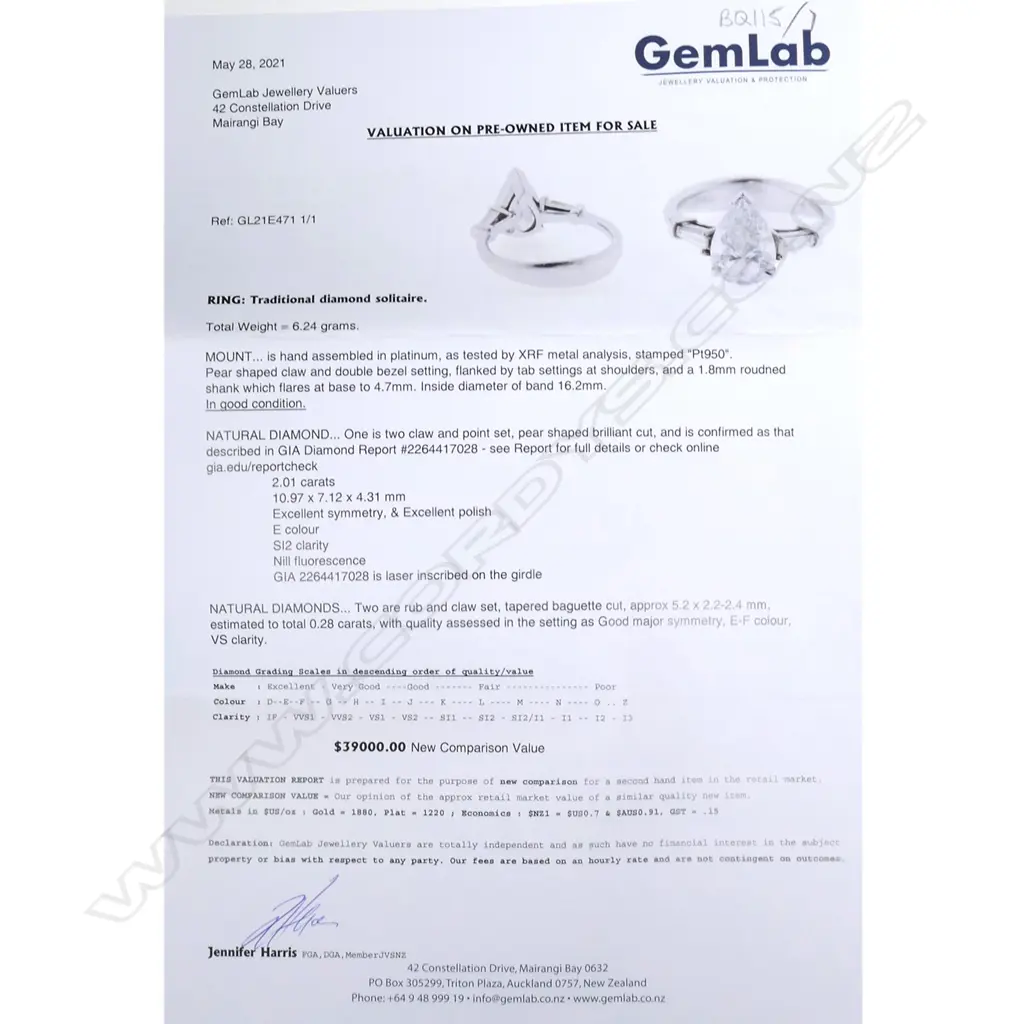 A platinum and diamond solitaire ring Image 1++