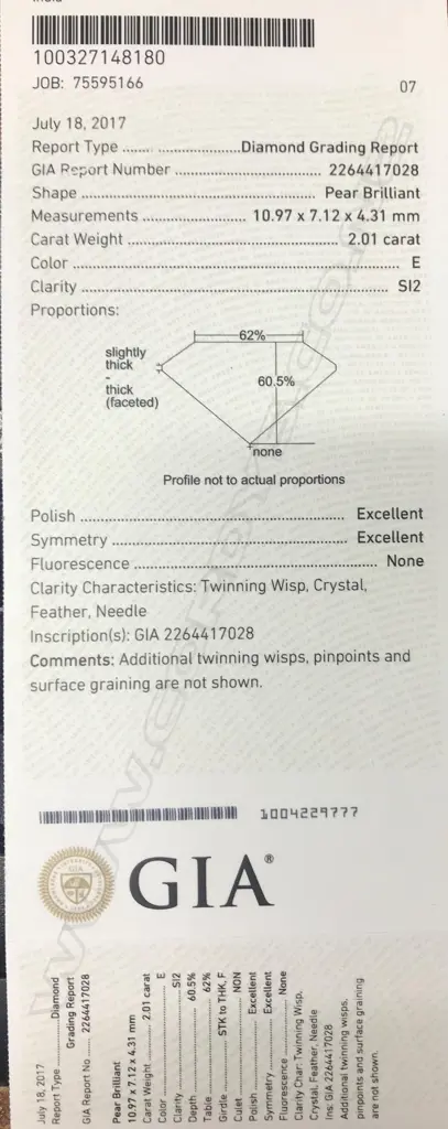 A platinum and diamond solitaire ring Image 1++