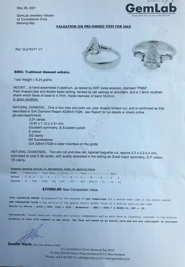 A platinum and diamond solitaire ring Image 1++