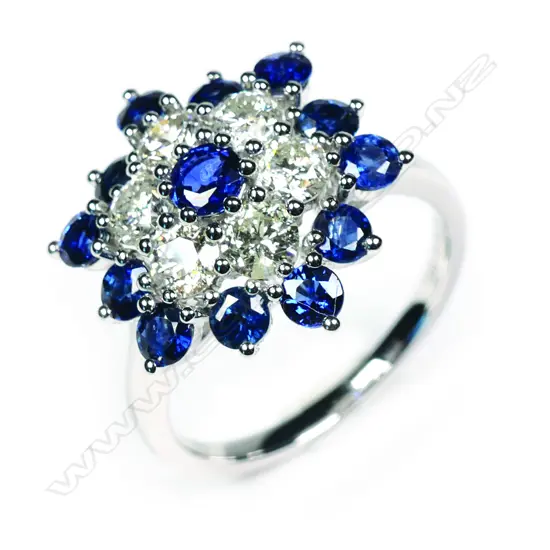 A 14ct white gold sapphire and diamond cluster ring