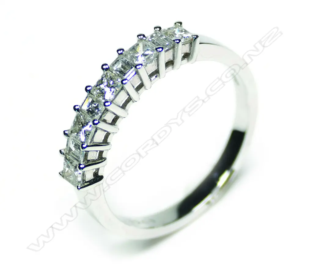 An 18ct white gold nine diamond ring Image 1++
