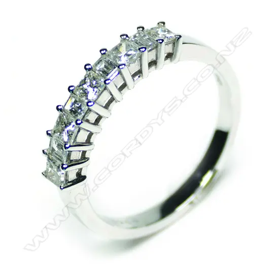 An 18ct white gold nine diamond ring