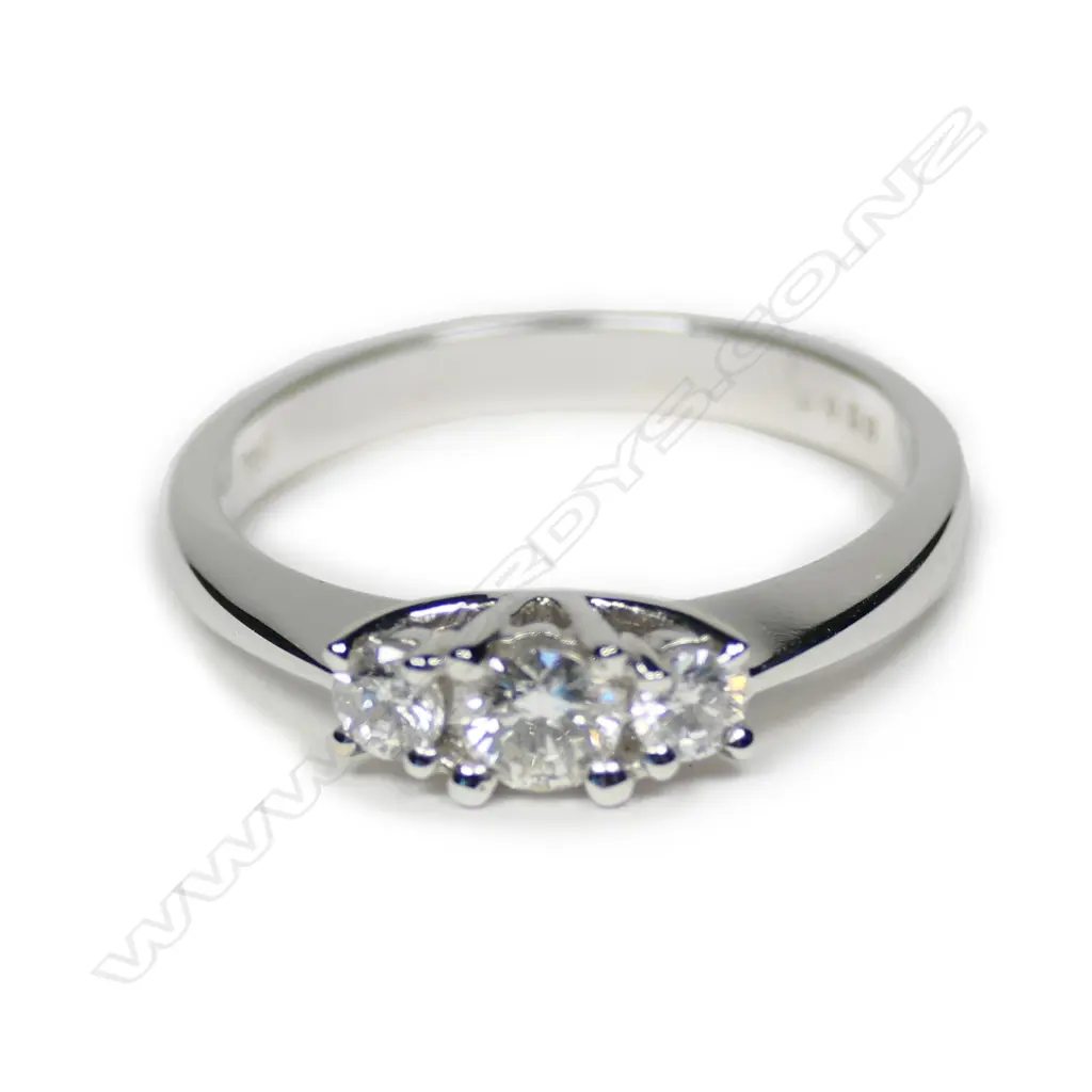 An 18ct white gold and 3 diamond ring Image 1++