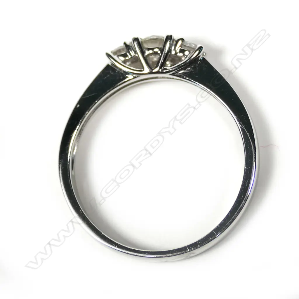 An 18ct white gold and 3 diamond ring Image 1++