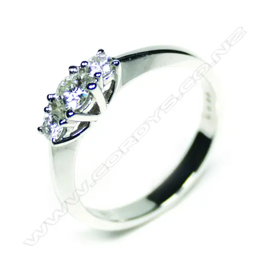 An 18ct white gold and 3 diamond ring