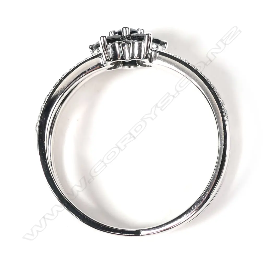 A 14ct white gold sapphire and diamond ring Image 1++