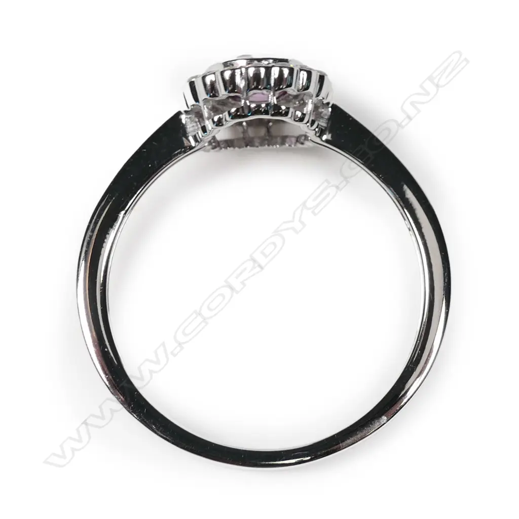 A 14ct white gold sapphire and diamond ring Image 1++