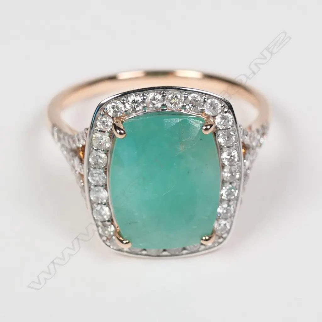 14ct rose gold Columbian emerald and diamond halo ring Image 1++