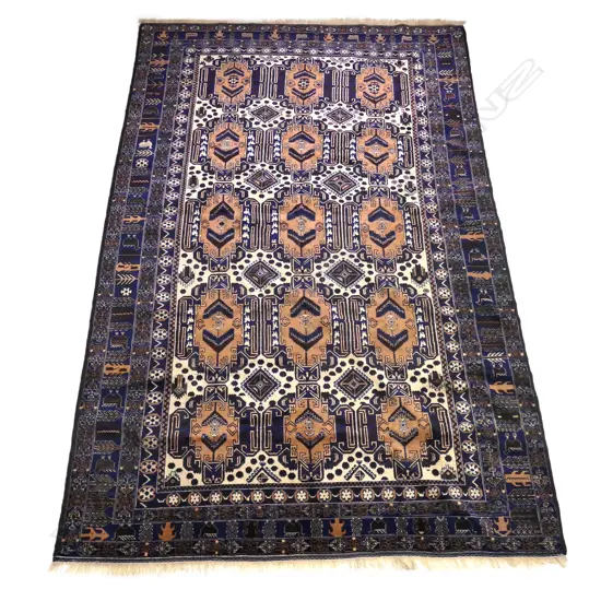 A large Iranian hand knotted Balouchi carpet