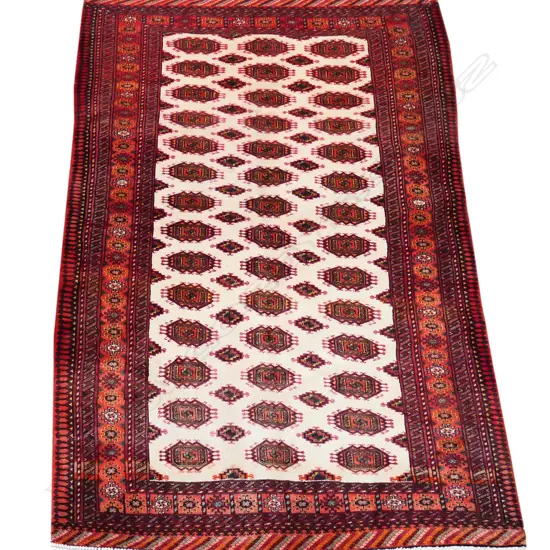 A Turkman tribal hand knotted carpet