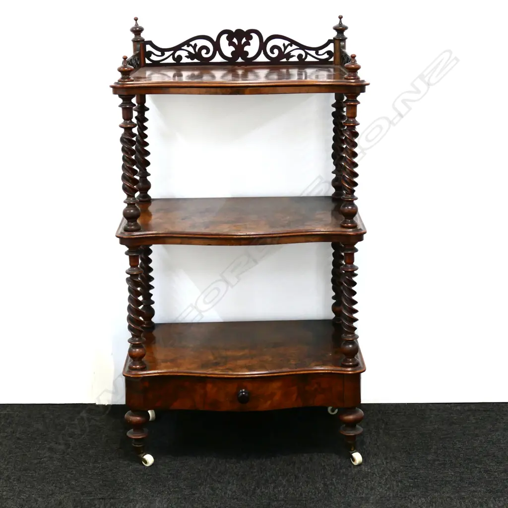 A Victorian walnut whatnot Image 1++