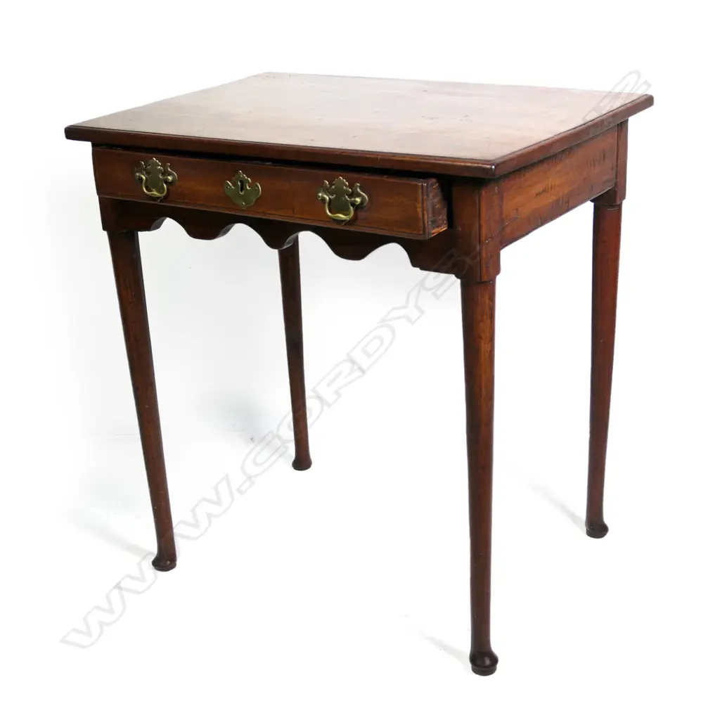 A Georgian mahogany lowboy Image 1++