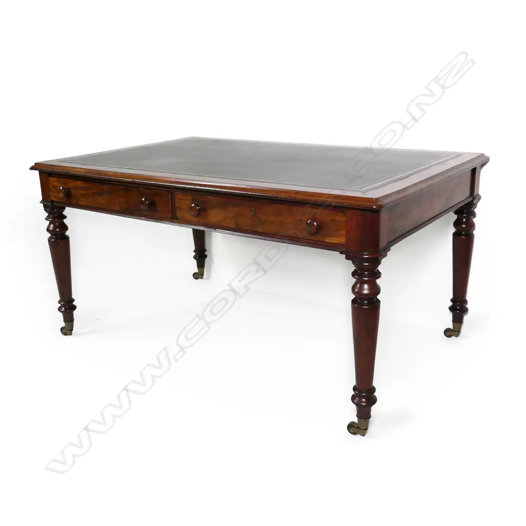 A Victorian oak or mahogany leather top library table Image 1++