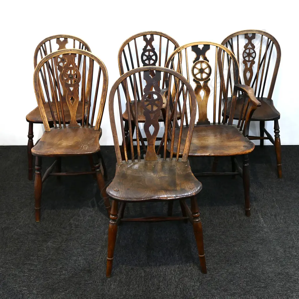 A set of six country elm wheel back chairs Image 1++