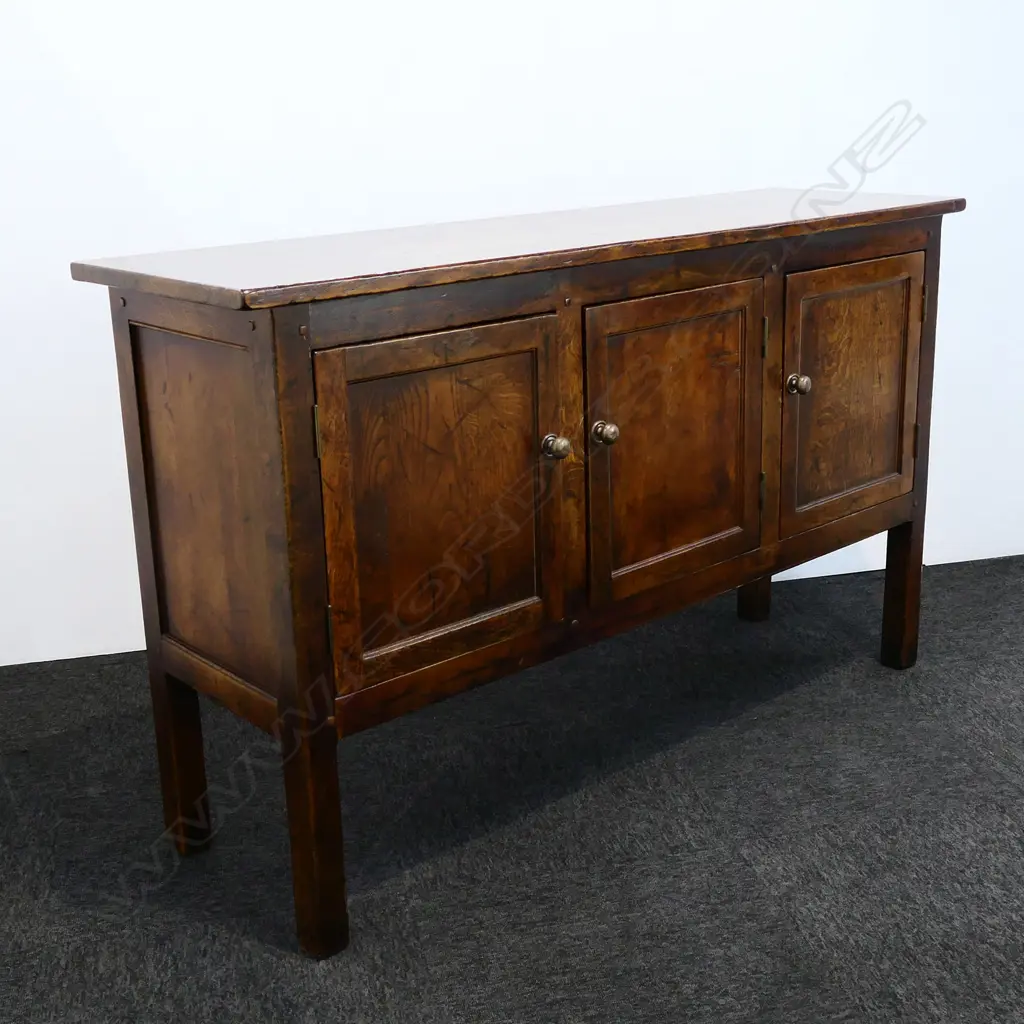 An oak Sefton Powrie style small sideboard Image 1++