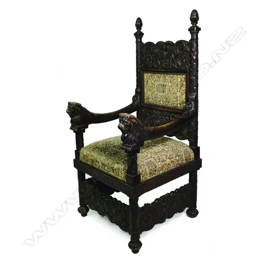 A Victorian oak baronial armchair