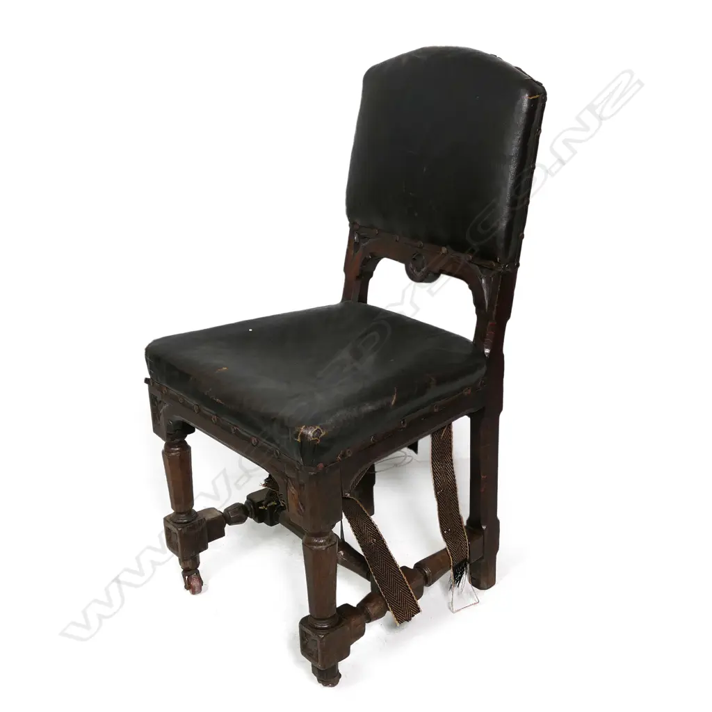 A set of four Victorian Gothic oak dining chairs Image 1++