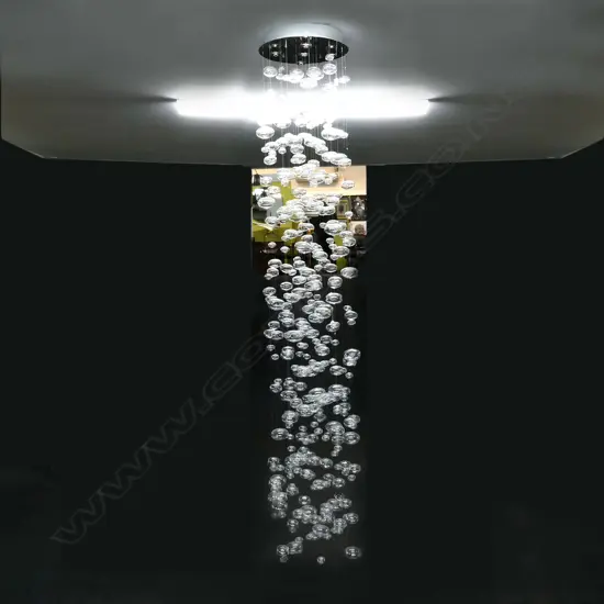 A contemporary long multi strand ceiling light fitting