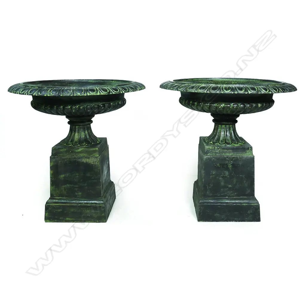 A pair of large and impressive cast iron garden urns Image 1++