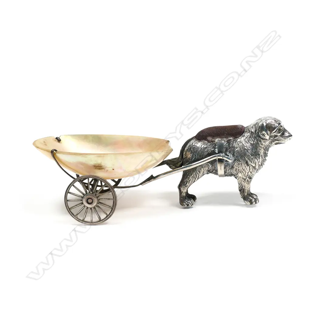 An uncommon Edwardian silver dog and cart pin cushion and thimble holder Image 1++