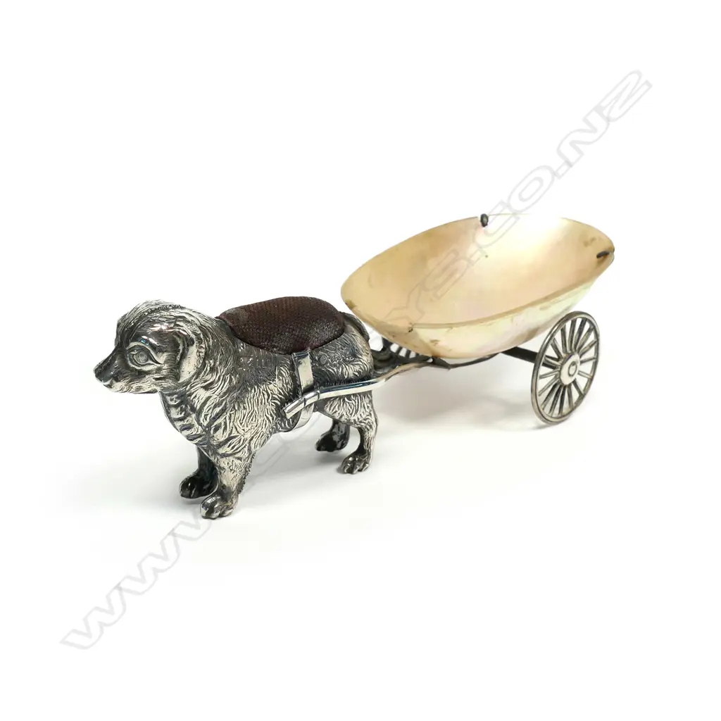An uncommon Edwardian silver dog and cart pin cushion and thimble holder Image 1++