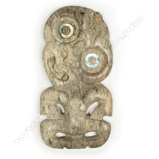 A Maori carved whale bone hei tiki