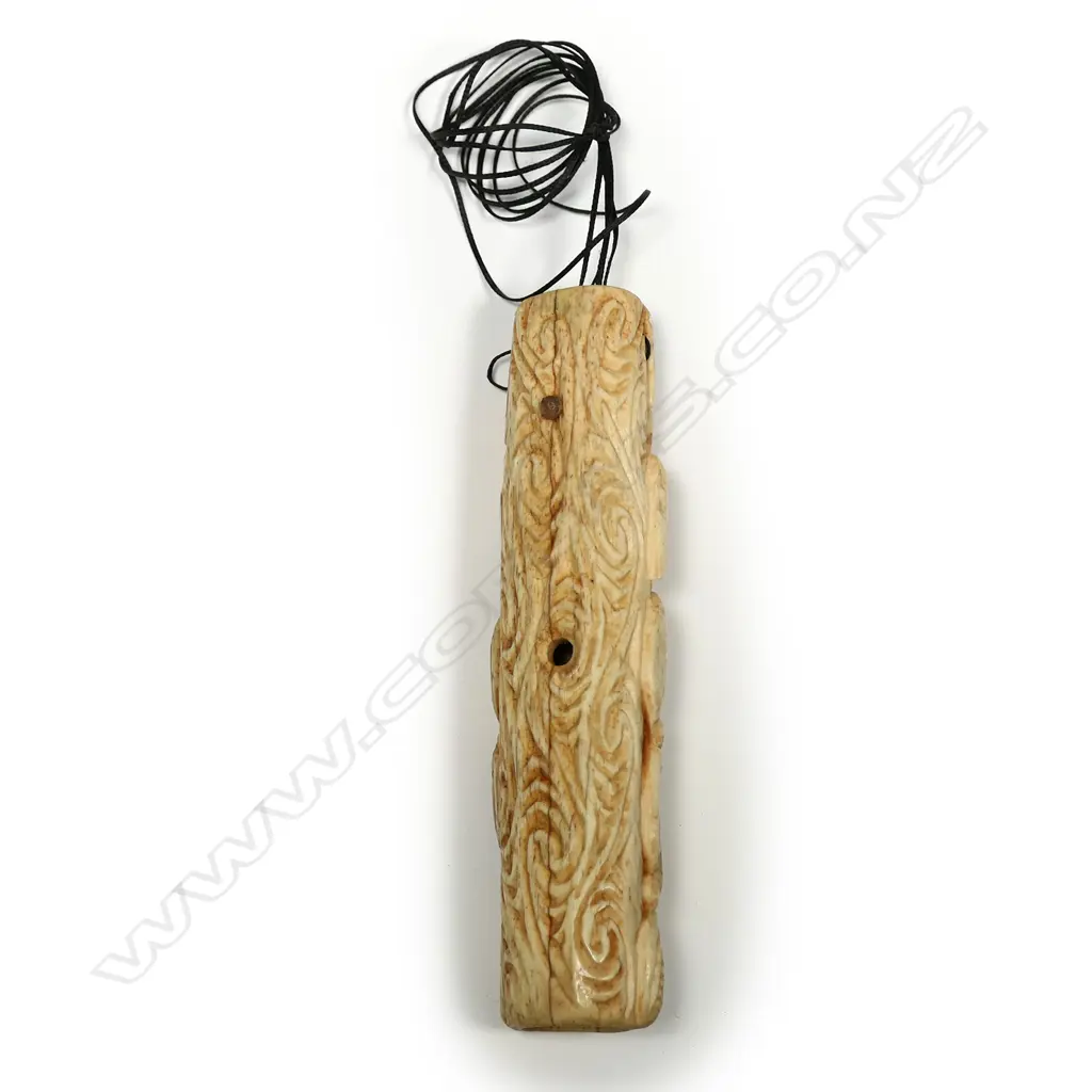 A Maori carved whalebone koauau (flute) Image 1++