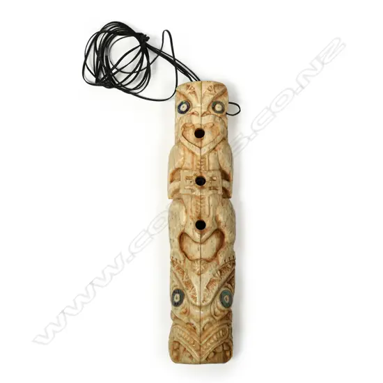 A Maori carved whalebone koauau (flute)
