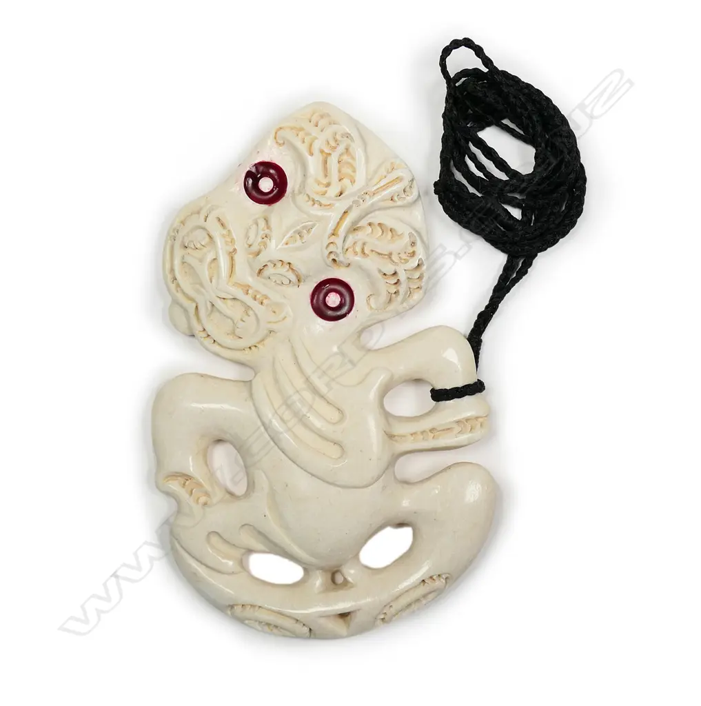 A late 20thC Maori carved whalebone hei tiki Image 1++