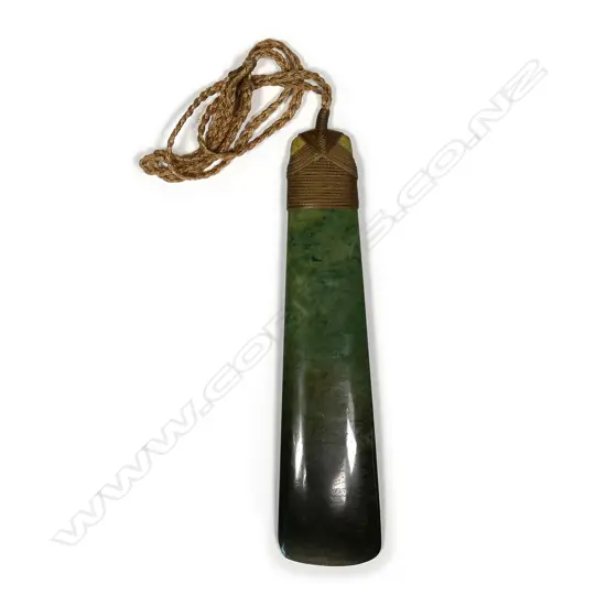 A carved Maori large pounamu hei toki