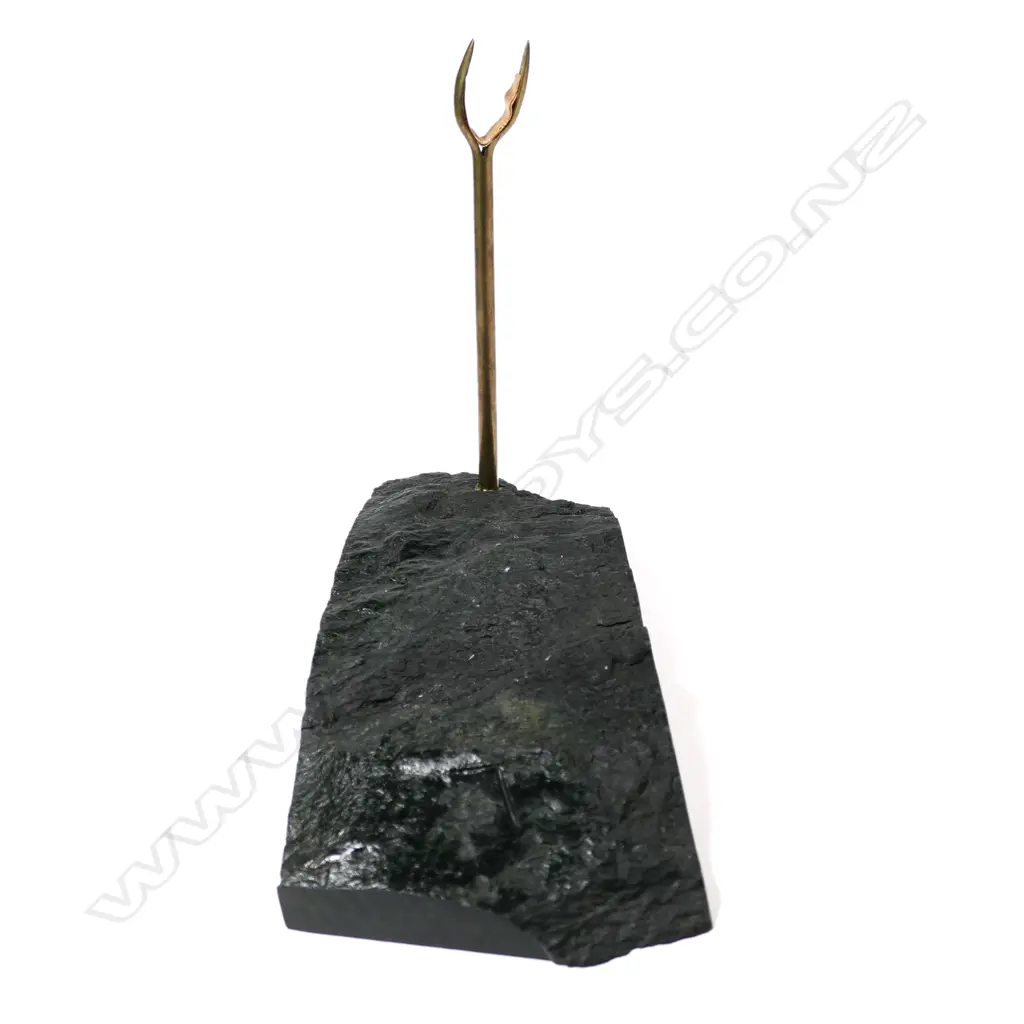 A contemporary dark pounamu mere display stand Image 1++