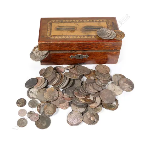 A collection of silver coins from the wreck of the SS Elingamite
