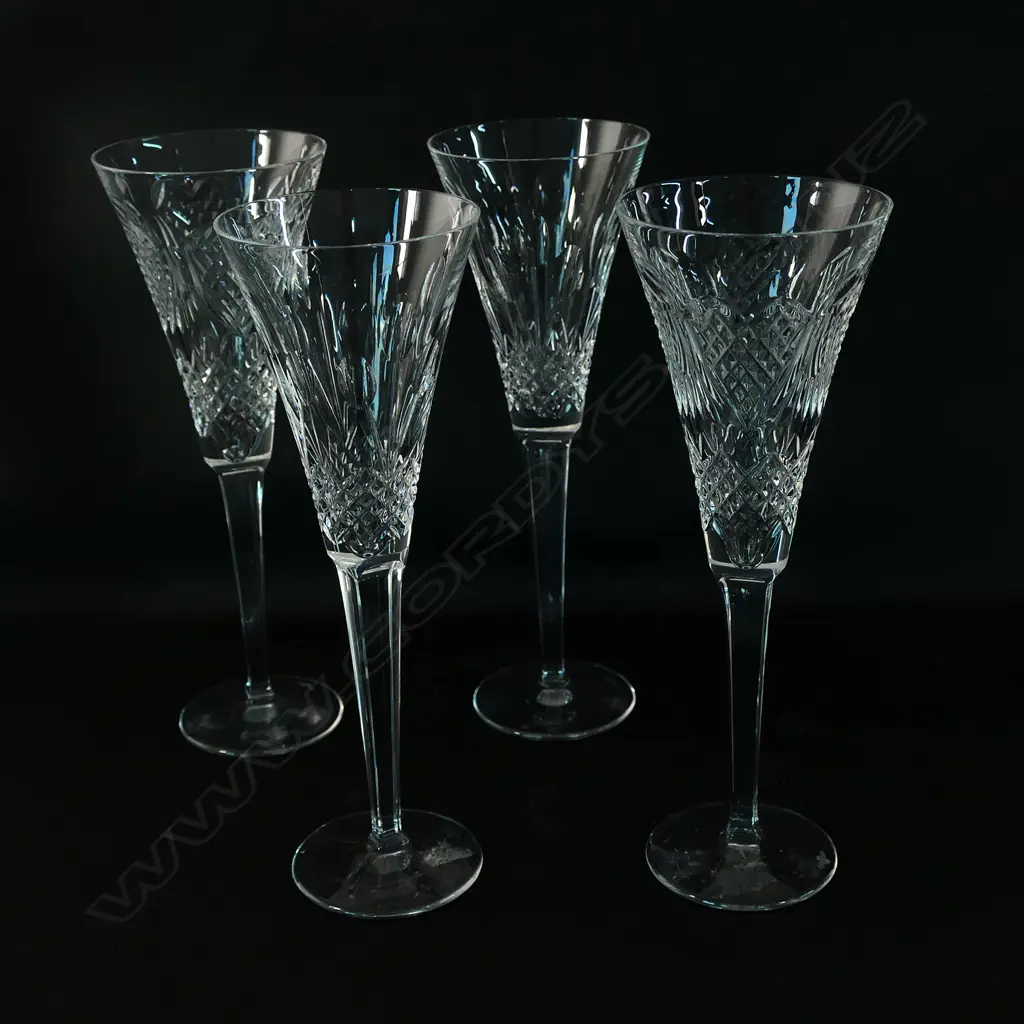 Four Waterford crystal champagne flutes Image 1++