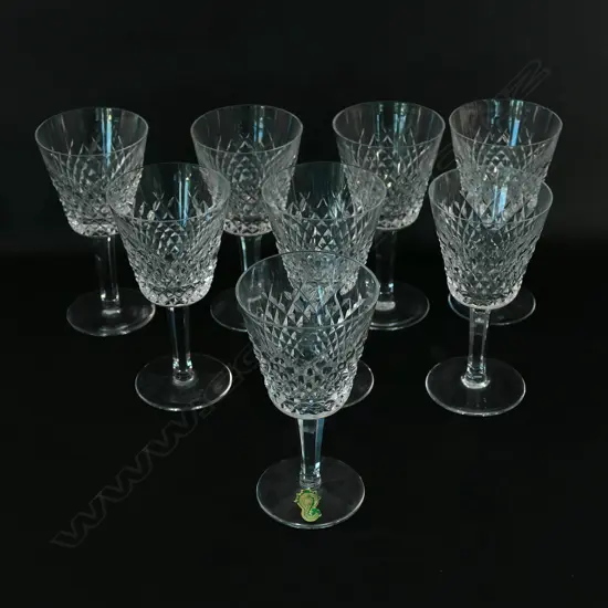 A set of eight Waterford crystal white wine glasses