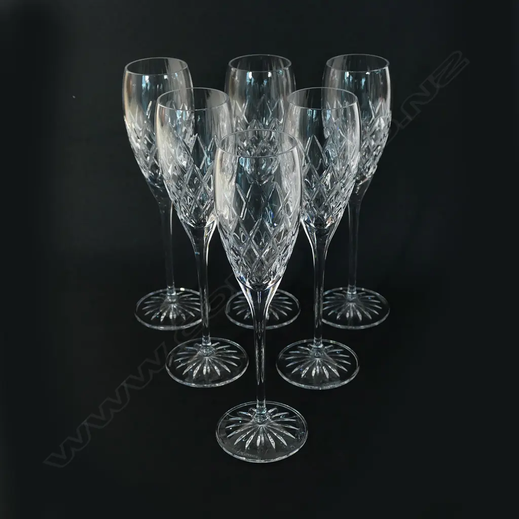 A set of six Waterford crystal champagne glasses Image 1++
