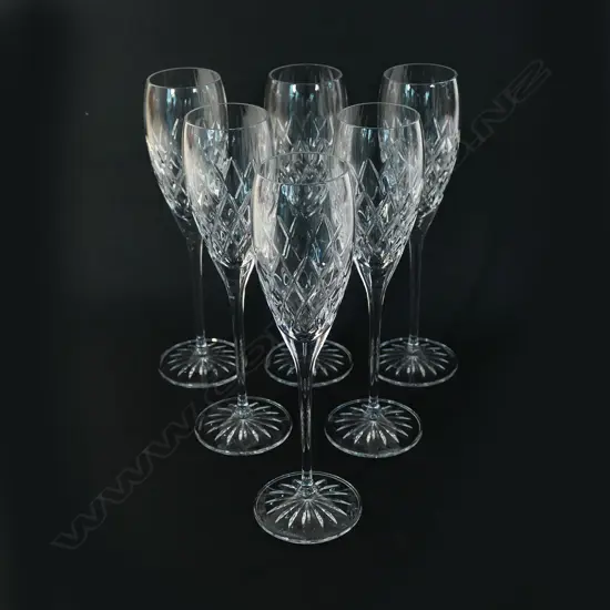 A set of six Waterford crystal champagne glasses