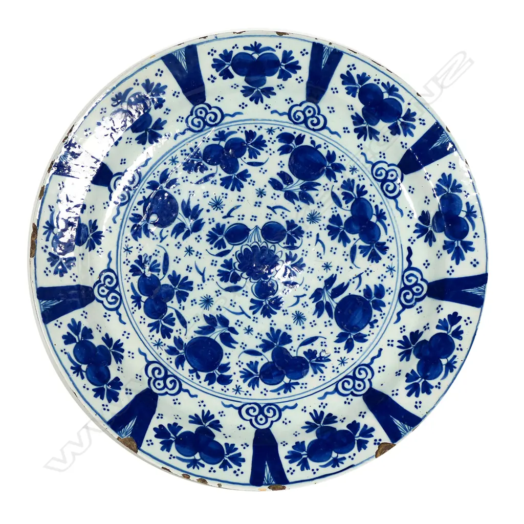 An 18thC Dutch Delft blue and white charger Image 1++