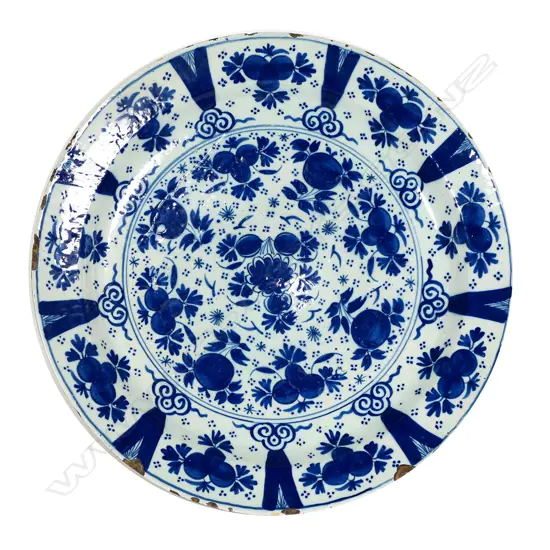 An 18thC Dutch Delft blue and white charger
