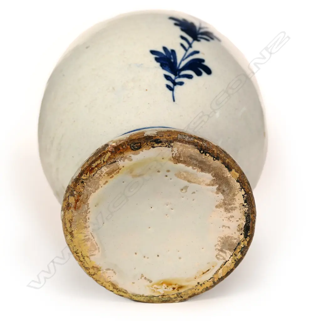 An 18thC Dutch Delft tin glaze blue and white ovoid vase Image 1++