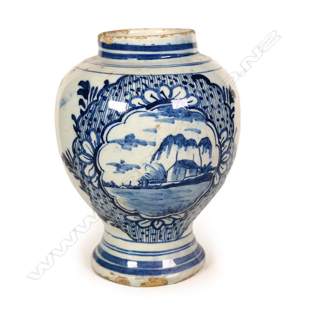 An 18thC Dutch Delft tin glaze blue and white ovoid vase Image 1++
