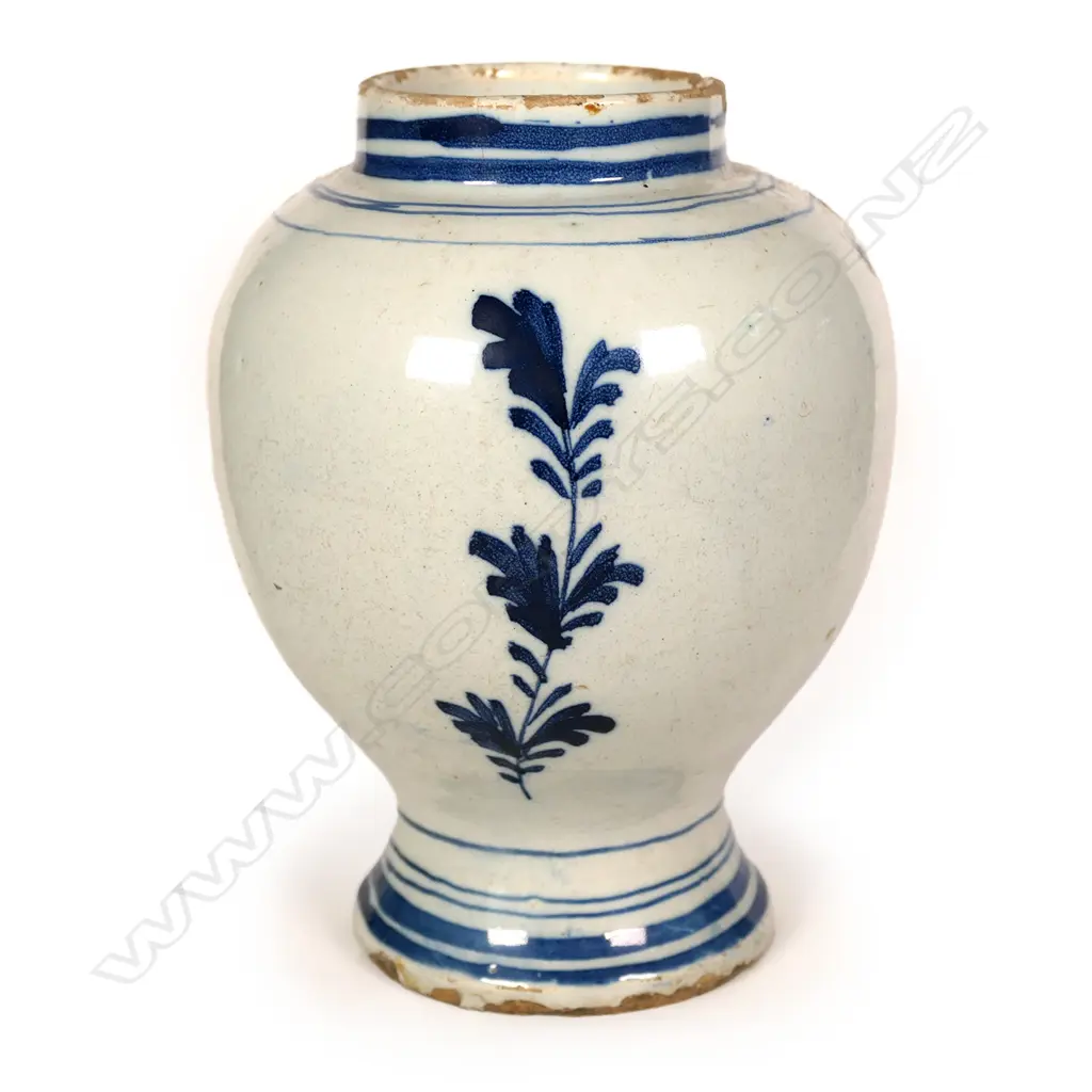 An 18thC Dutch Delft tin glaze blue and white ovoid vase Image 1++