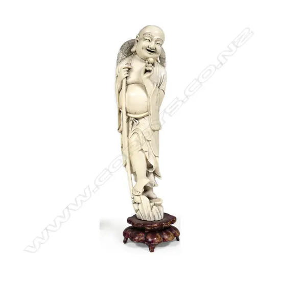 A Chinese carved ivory laughing Buddha