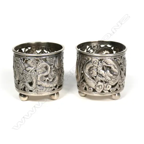 A c.1900 pair of Chinese silver condiment pots