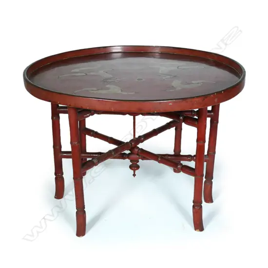 A c.1900 Japanese red lacquer folding base table