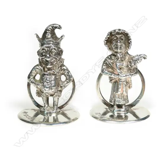 A pair of Edwardian Punch and Judy menu or place name holders